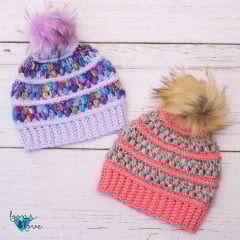 crochet beanie with puff stitches and pom poms