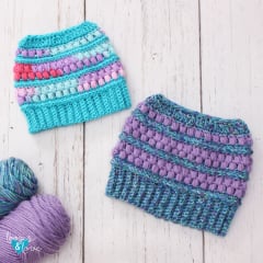 crochet messy bun beanies in bright colors