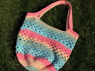 crochet tote bag in the grass