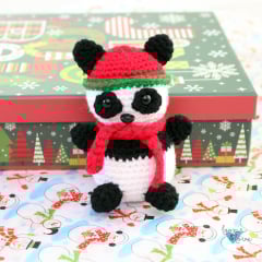 crochet panda ornament with holiday colors
