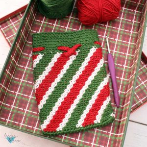 crochet christmas bag with red, white, green stripes