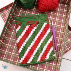 crochet christmas bag with red, white, green stripes
