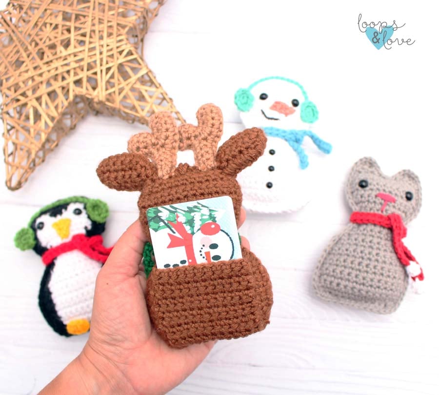 Crochet reindeer ornament with a gift card pocket on the back