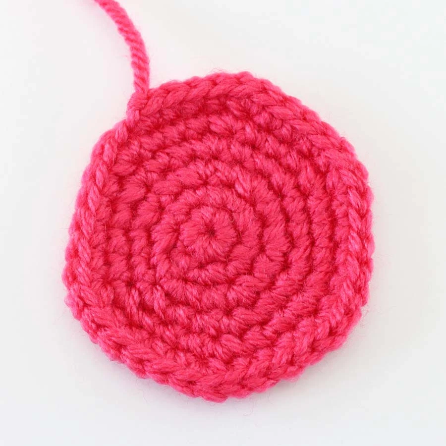 the bottom of the mini crab amigurumi before sewing together
