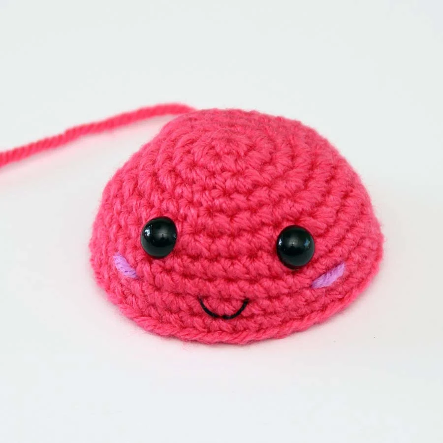 the top of mini crab amigurumi